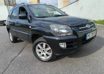 DOWIOZĘ Kia Sportage 4x4 z blokada. udokumen. 148tyś hak klima dwu-strefowa