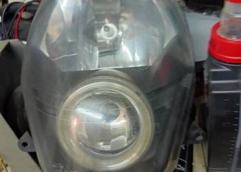 Reflektor Sym 125 gts cyklop