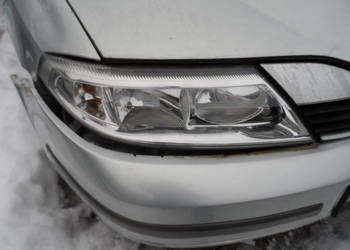 Renault Laguna II reflektor lewy lub prawy