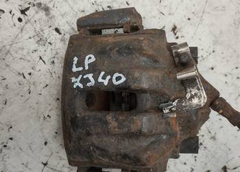 JAGUAR XJ40 zacisk jarzmo lewy przód