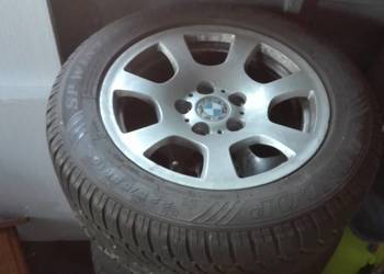 Bmw 5 2006 r Felgi aluminiowe z oponami zimowymi