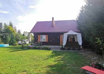 Sprzedam działkę budowlaną 1200m2 z domem drewnianym.
