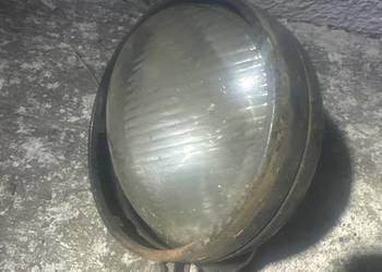 Stary, metalowy reflektor szperacz