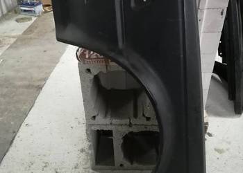 nissan bluebird U11 błotnik przód lewy nowy