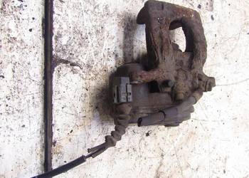 ZACISK HAMULCOWY PRAWY PRAWA TYLNY 1.6 DCI NISSAN QASHQAI J11