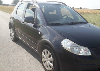 Suzuki sx4  1,6 B,  107 Koni