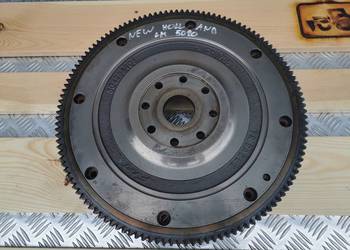 New holland TD 95 {Koło zamachowe}