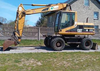 Cat 315 umowa koparka kołowa