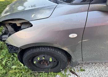 BŁOTNIK LEWY PRZÓD SUZUKI SWIFT MK7 ZCD