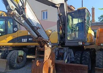 Volvo EW160 (kołowa koparka, produkcja 1999)