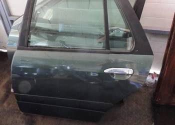 Drzwi kompletne Nissan Primera P11 Kombi DV9