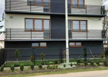 Dom z budynkami gospodarczymi