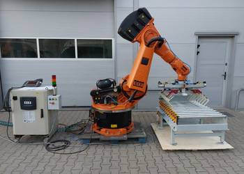Zrobotyzowana paletyzacja worków kartonów paletyzator robot KUKA ABB FANUC